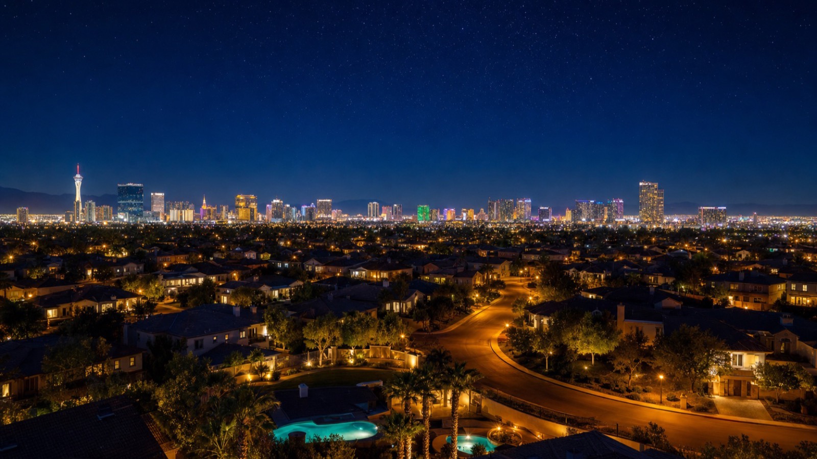 North Las Vegas Strip corridor high-rise towers with the Stratosphere and resort skyline in the distance